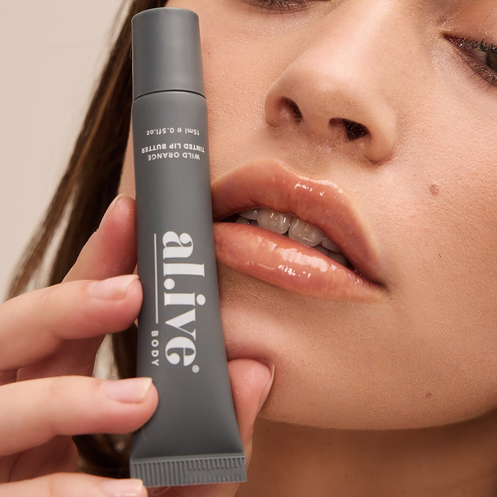 al.ive body - Tinted Lip Butter - Wild Orange